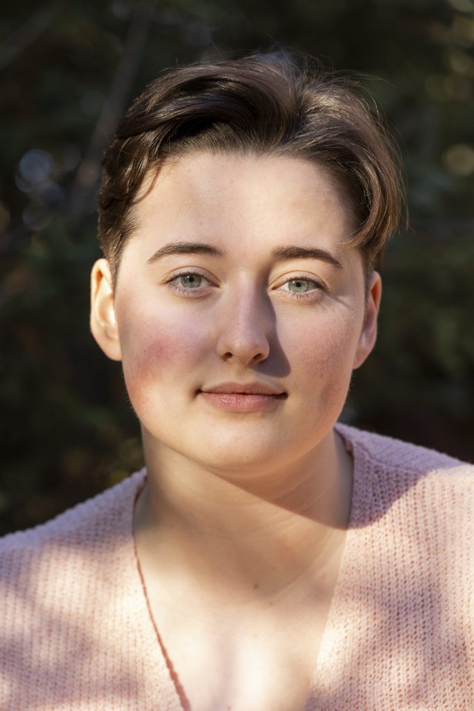 J MELDRUM HEADSHOT NOV 2022 PINK